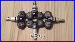 4-BMW TIRE PRESSURE SENSOR TPMS OEM 36106790054, 6790054 Set of 4 complete